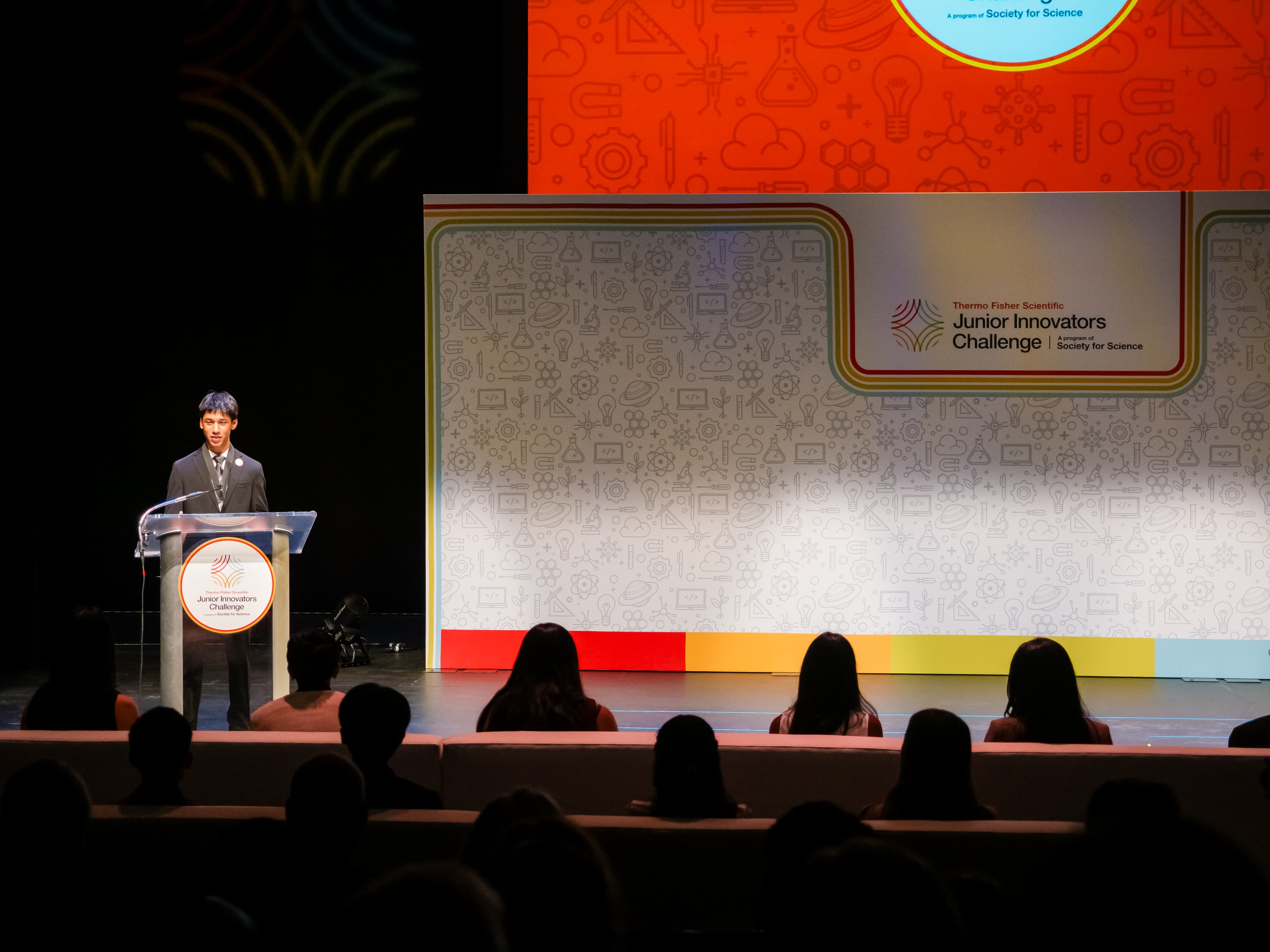 Akhil Nagori standing with other Junior Innovators Challenge student award winners
